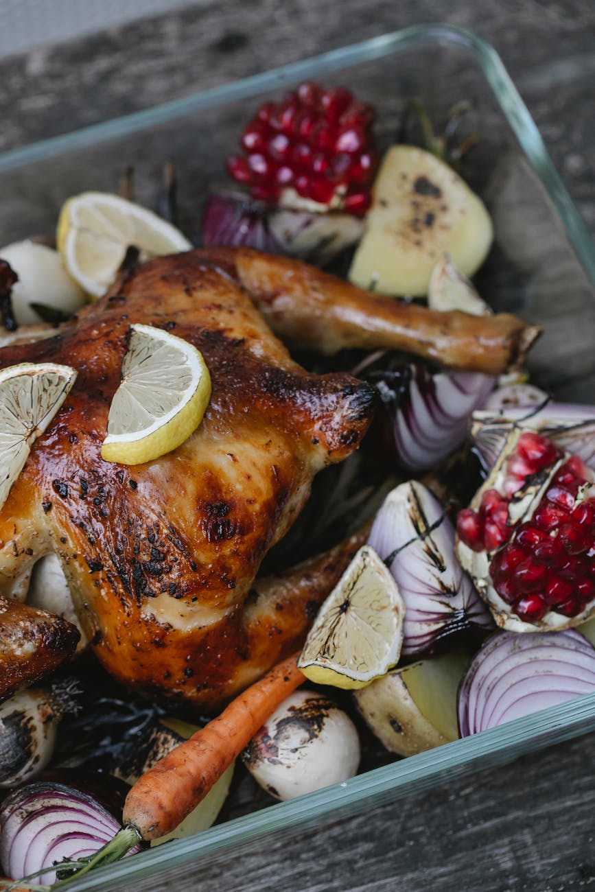 delicious roasted chicken with assorted vegetables and fruits